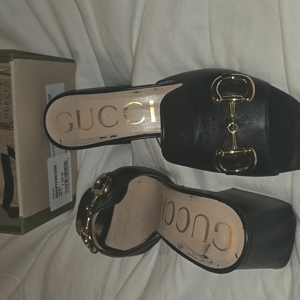 Gucci Black Leather Mules with Gold Accents
